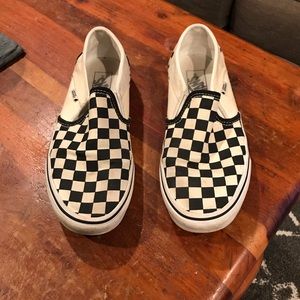 Black and white checkered slip on vans